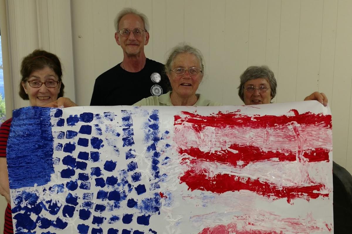 Topsfield Artists Hold Up Flag Day Masterpiece