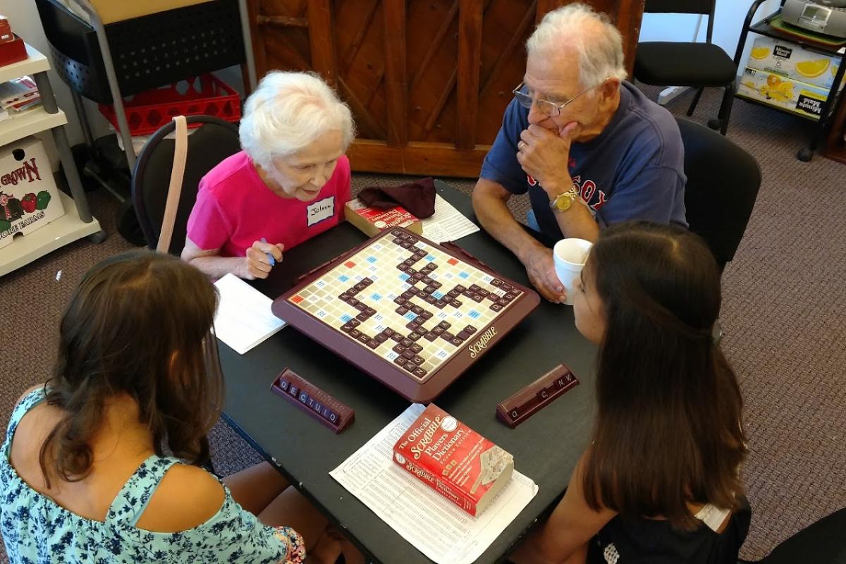 Seasoned Scrabble Players Offer Advice during our First Intergenerational Game Day