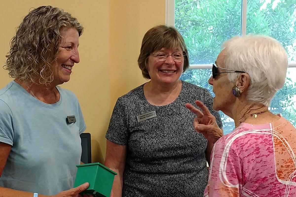 Librarians Chat with a Senior during Our First Annual Intergenerational Coffee and Conversation