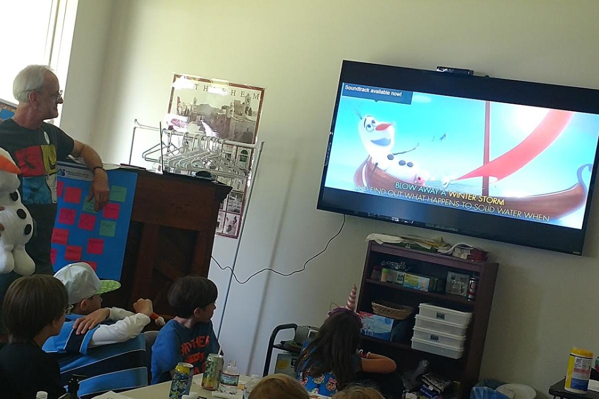 Guests Enjoy Watching Clips from Disney Movies during Intergenerational Week