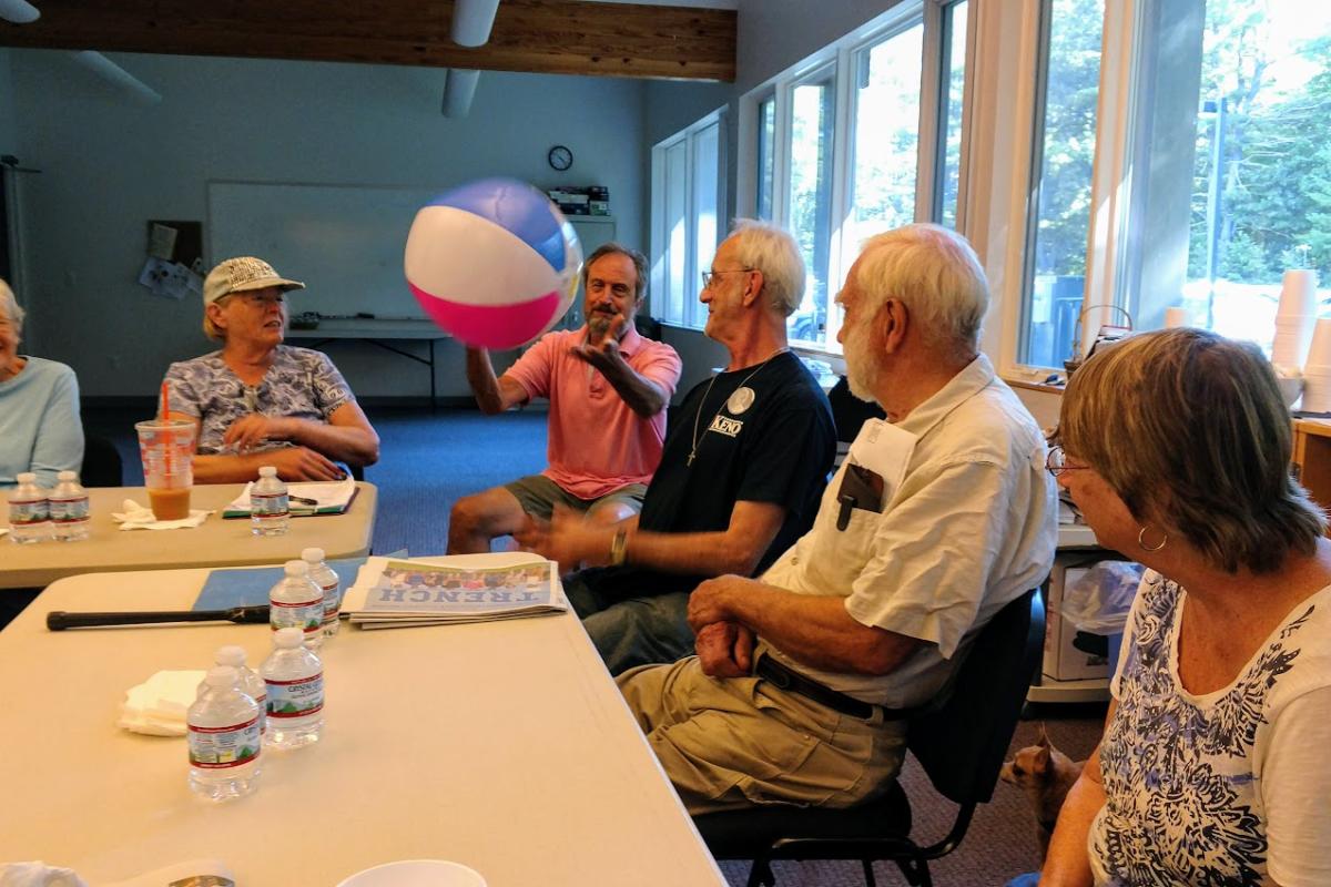 Guests Toss around a Beach Ball during Presentation on Parkinson's Fitness Class