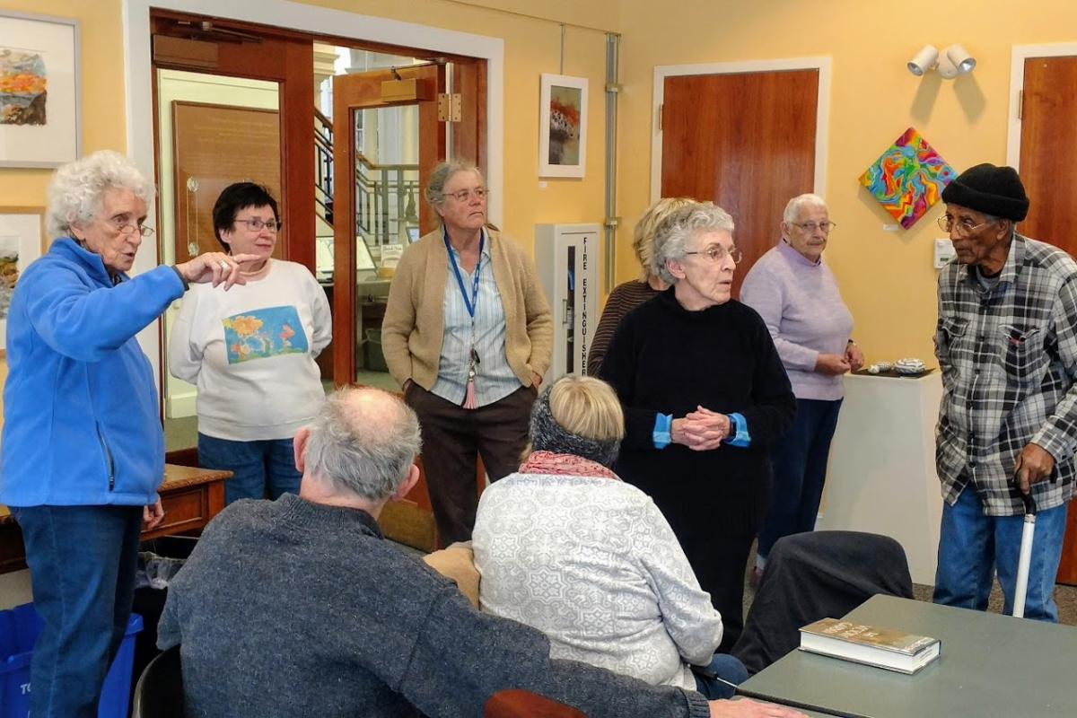 At Our Off-Site ArtVenture Local Artist Carol White Gave TopsCOA a Private Tour of Works on Display in the Library Meeting Room