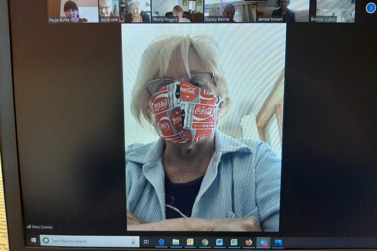 Woman wears mask in Zoom meeting