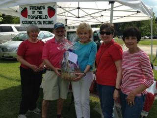 Friends of the Topsfield Council on Aging Present Raffle Winner with Prize